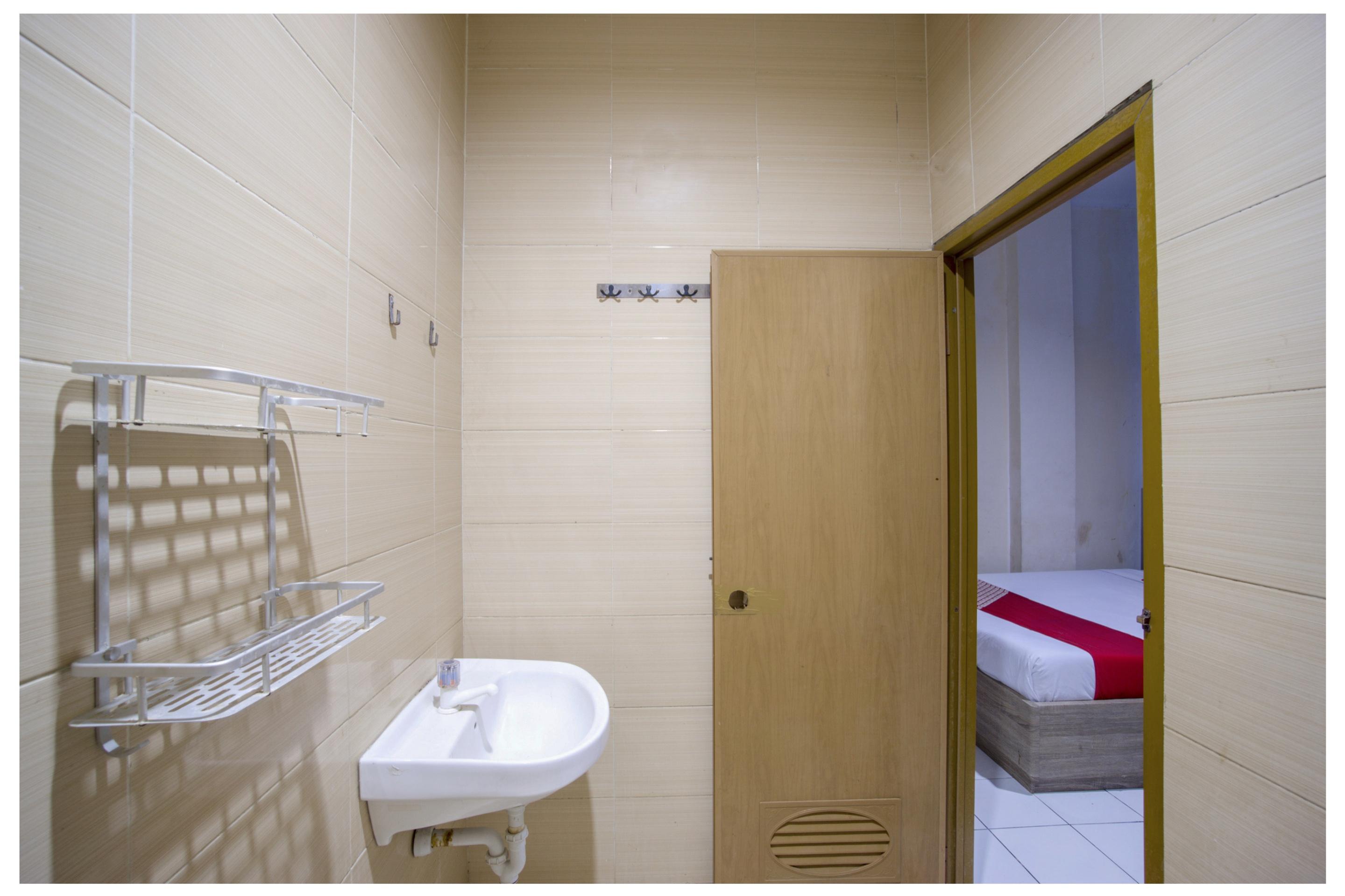 Hotel Oyo 3754 Prosperity Mansion à Jakarta Extérieur photo